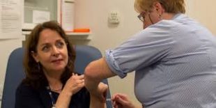 Helen Donovan having her flu jab